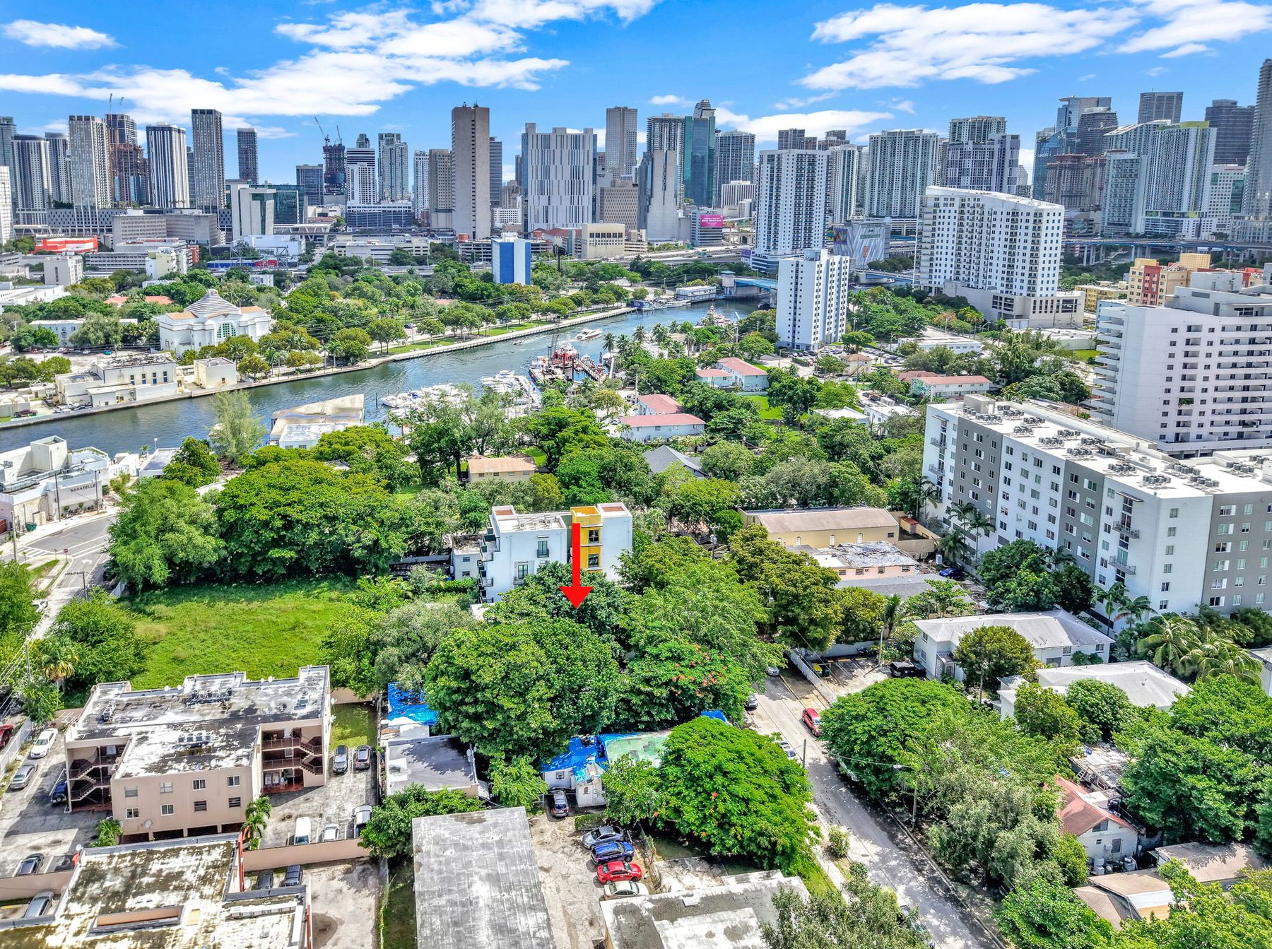 Aerial view over the property toward the Miami River and Downtown Miami
